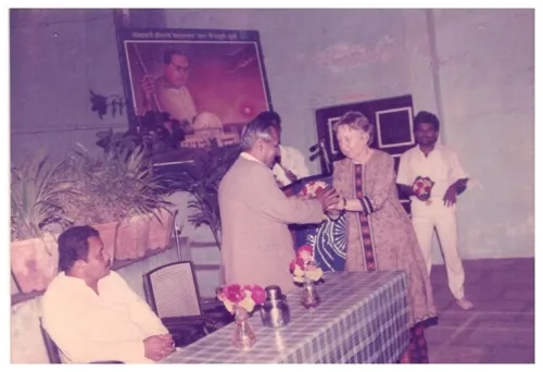 Recognition of Dr. Maxine Berntsen at a community programme