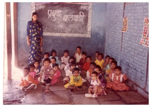 Sanghamitra Ahiwale teaching young children at the pre-primary school in 1993